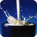 Milk being poured into glass