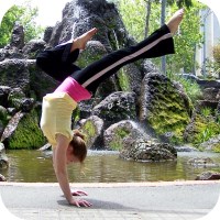 Exercise and Fertility: Woman performing handstand