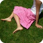 Girl sitting on grass